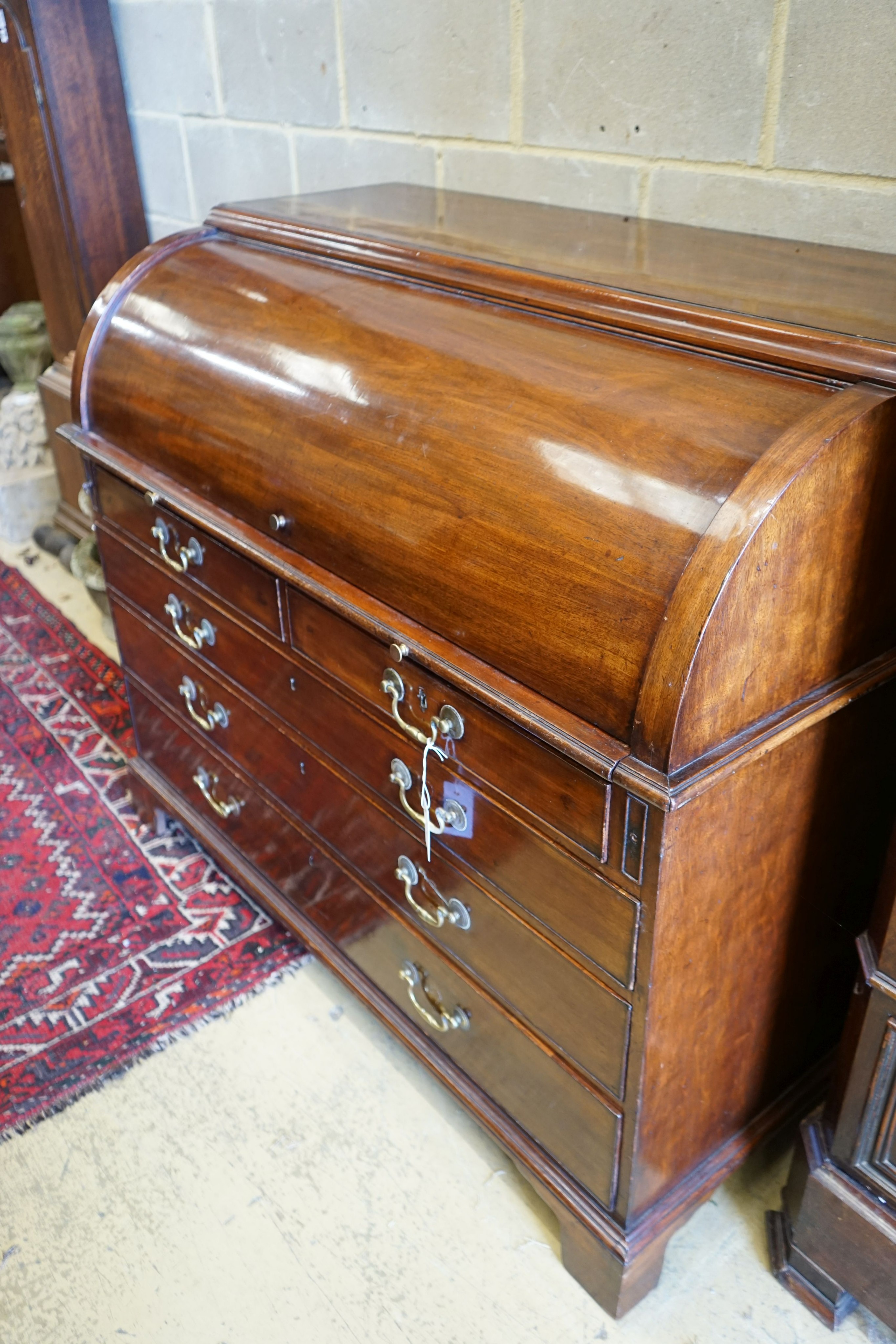 A George III mahogany cylinder bureau, width 127cm, depth 67cm, height 107cm